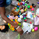 A man dries his toys after he recovered them from the debris left by Hurricane Matthew in Les Cayes, Haiti, Thursday, Oct. 6, 2016. Two days after the storm rampaged across the country’s remote southwestern peninsula, authorities and aid workers still lack a clear picture of what they fear is the country’s biggest disaster in years. (Image: AP)